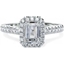 Picture of A stunning emerald cut diamond Halo ring with shoulder stones in platinum