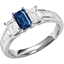 Picture of A breathtaking Emerald Cut Sapphire and Diamond three stone ring with shoulders in 18ct white gold