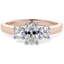 Picture of A stunning Oval & Round Brilliant Cut diamond ring in 18ct rose & white gold