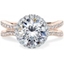 Picture of A stunning round brilliant cut diamond halo cluster in 18ct rose gold & platinum