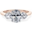 Picture of A stylish oval cut diamond 3 stone ring in 18ct rose & white gold