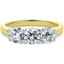 Picture of An eye catching Round Brilliant Cut three stone diamond ring in 18ct yellow & white gold