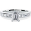 Picture of An elegant Emerald Cut diamond ring with shoulders stones in 18ct white gold