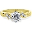 Picture of An elegant Round Brilliant Cut diamond ring with shoulder stones in 18ct yellow & white gold
