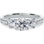 Picture of A breathtaking Round Brilliant Cut three stone diamond ring with shoulder stones in platinum