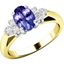 Picture of A timeless tanzanite & diamond ring with shoulder stones in 18ct yellow & white gold