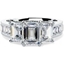 Picture of A breathtaking Emerald Cut three stone diamond ring with shoulders in 18ct white gold