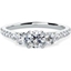 Picture of A classic Round Brilliant Cut three stone diamond ring with shoulder stones in platinum