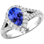 Picture of A sensational Tanzanite and diamond halo cluster with shoulder stones in 18ct white gold
