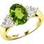 Picture of A stylish peridot & diamond ring with shoulder stones in 18ct yellow & white gold