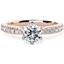 Picture of An exquisite solitaire diamond ring with shoulder stones in 18ct rose & white gold