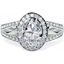 Picture of A beautiful oval diamond cluster style ring with shoulder stones in 18ct white gold
