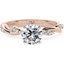 Picture of A stunning Round Brilliant Cut diamond ring with shoulder stones in 18ct rose & white gold