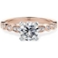 Picture of A beautiful Round Brilliant Cut diamond ring with shoulder stones in 18ct rose & white gold (In stock)